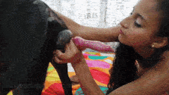 Xiomara con tres perros