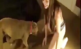 85669 girl pleasures her dog